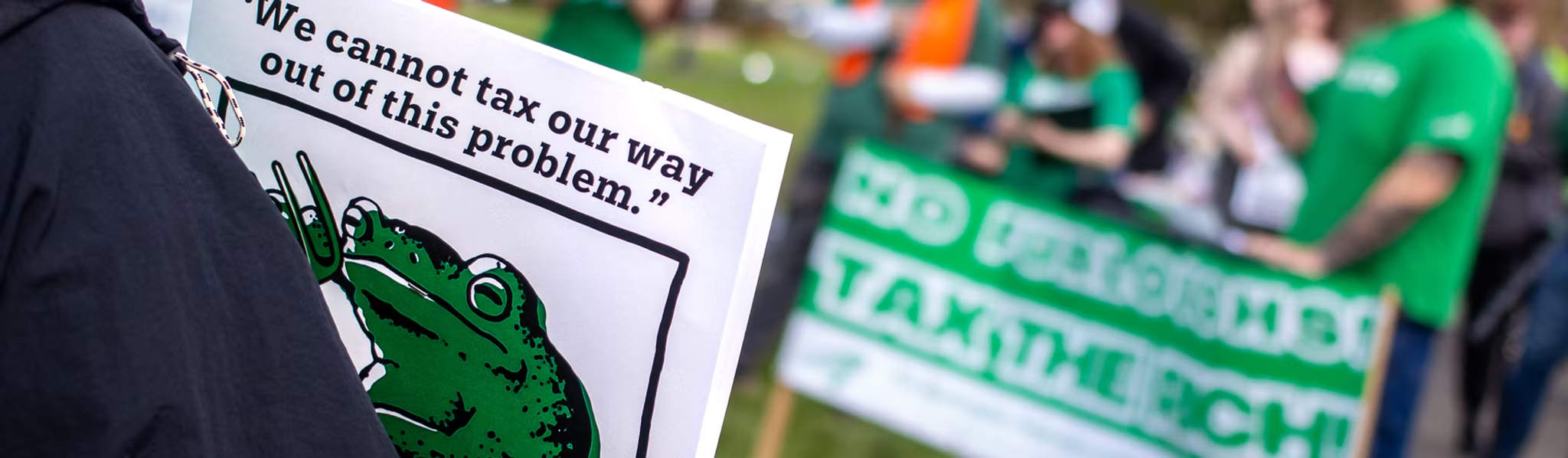 Signs and pickets at a union rally